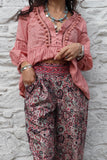 Pink paisley trousers