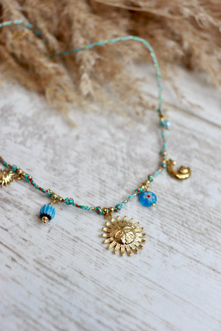 Sun charm necklace