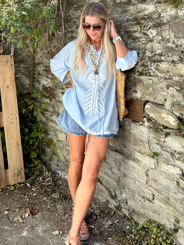Light blue embroidered peasant blouse