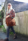 Fringe camel handbag