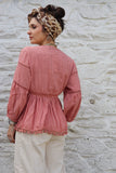 Pom pom detail tiered peach blouse