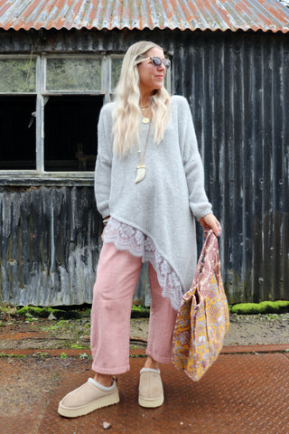 Asymmetrical lace trim long jumper