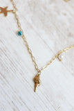 Conch shell charm necklace