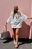 Longline floral crochet top