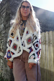 Crochet colourful granny square cardigan