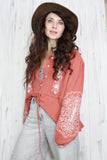 Floral embroidered rust blouse