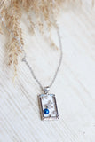 The world tarot card necklace