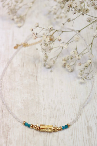 Rolling barrel necklace with white beads (Gold)