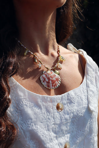 Clam shell and fish necklace