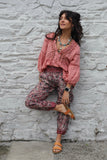 Pink paisley trousers