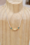 Rolling barrel necklace with white beads (Gold)