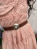 Etched buckle braided leather belt