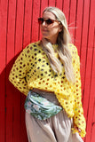 Yellow open-knit crochet top