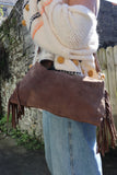 Slouchy leather handbag with fringe detail