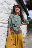 Turquoise border print blouse