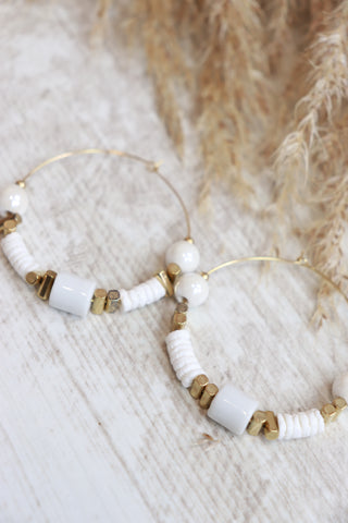 White beaded hoop earrings