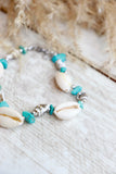 Cowrie shell and blue beaded bracelet