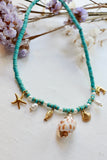 Blue beaded seaside charm necklace