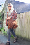 Fringe camel handbag