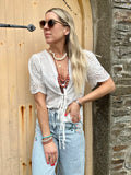 Broderie tie front blouse