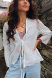 White embroidered tie front blouse