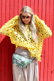 Yellow open-knit crochet top