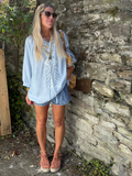 Light blue embroidered peasant blouse
