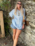 Light blue embroidered peasant blouse
