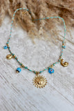 Sun charm necklace