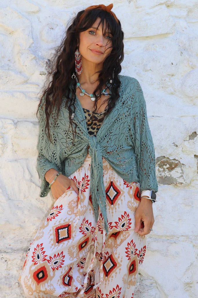 Open knit wrap blouse