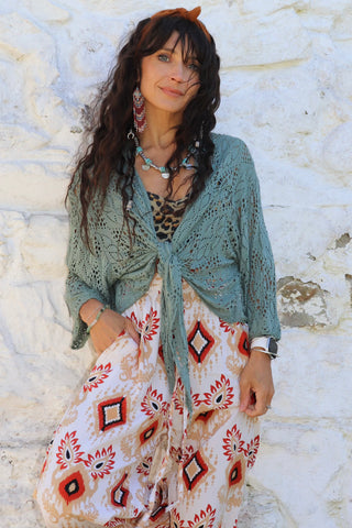 Open knit wrap blouse