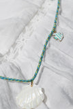 whale tail and shell beaded necklace