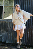 Criss cross knit cream jumper