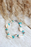 Cowrie shell and blue beaded bracelet